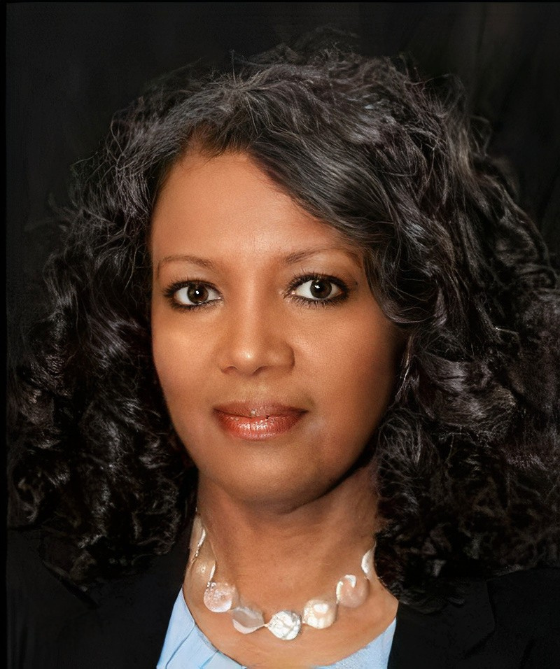Professional headshot of Deirdre Edwards, PD Administrator, smiling at the camera.